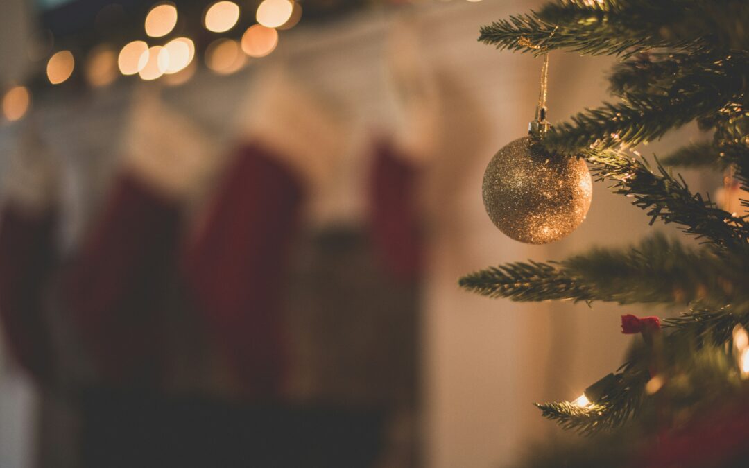 Christmas tree ornament hanging from the tree, holidays lights, bokeh, cozy fireplace, peaceful, mental health
