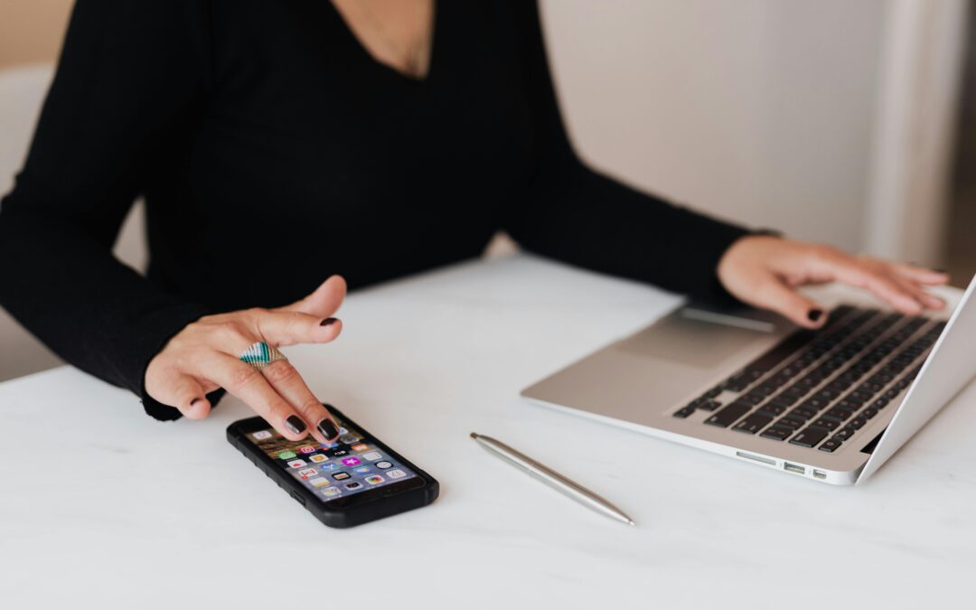 Small Business Website - small business owner on laptop and smart phone